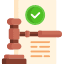 A judge 's gavel and paper with a green check mark on it.