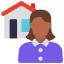A woman standing in front of a house.